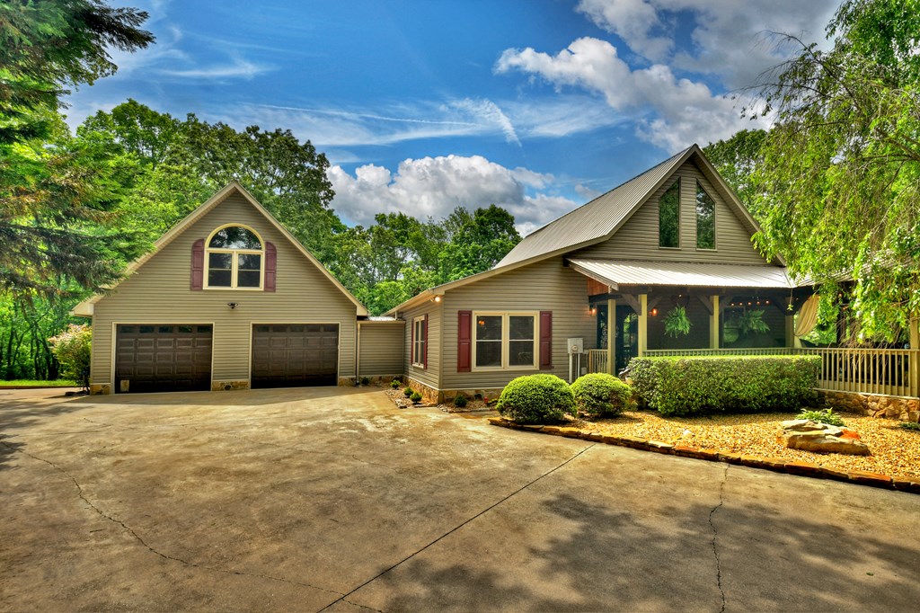270 Stone Lane Blue Ridge, GA 30513 - Photo 69 of 70 a front view of a house with garden
