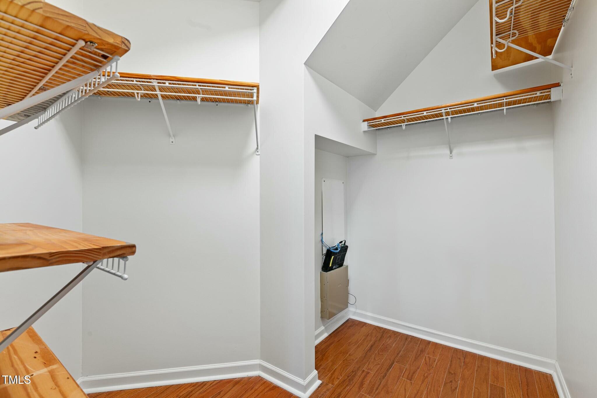 13338 Ashford Park Drive Raleigh, NC 27613 - Photo 20 of 44 a view of walk in closet with clothes
