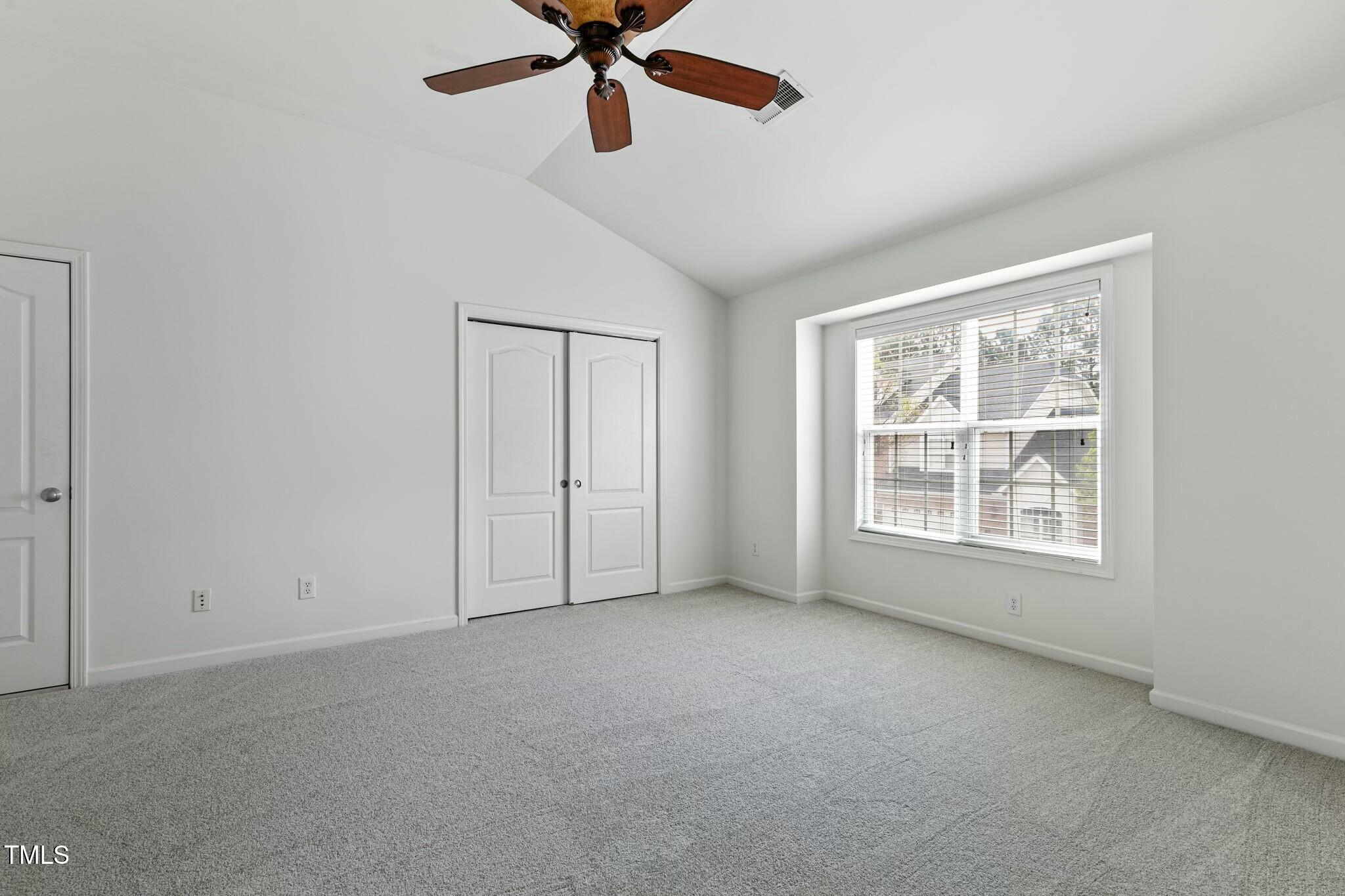 13338 Ashford Park Drive Raleigh, NC 27613 - Photo 31 of 44 a view of an empty room with a window