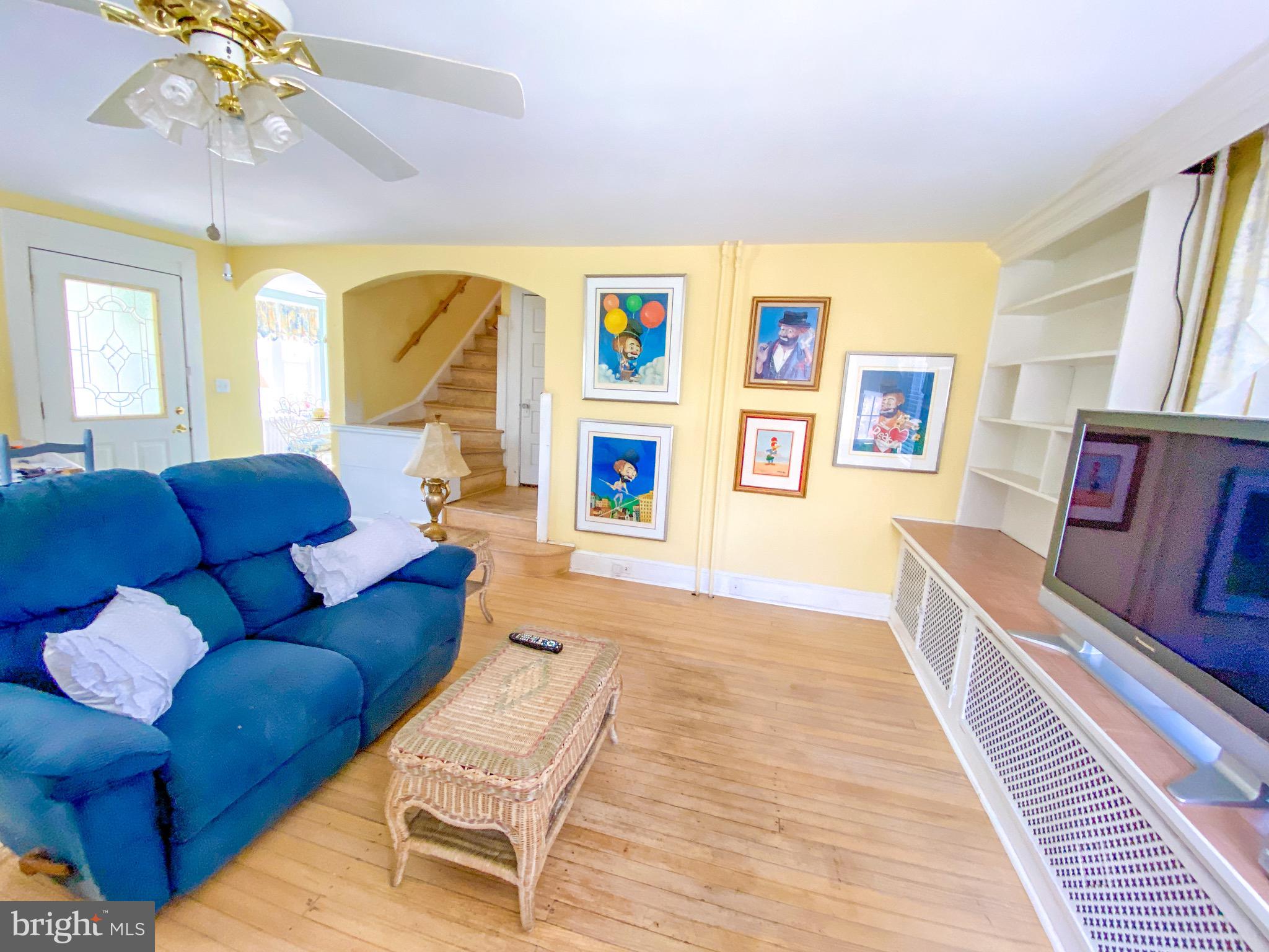 306 Hawthorne Road Linthicum Heights, MD 21090 - Photo 19 of 50 Living room looking toward stairs to upper level