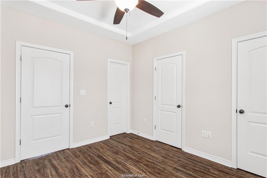 2108 Cavitt Avenue, Unit C Bryan, TX 77801 - Photo 13 of 14 a view of empty room with wooden floor