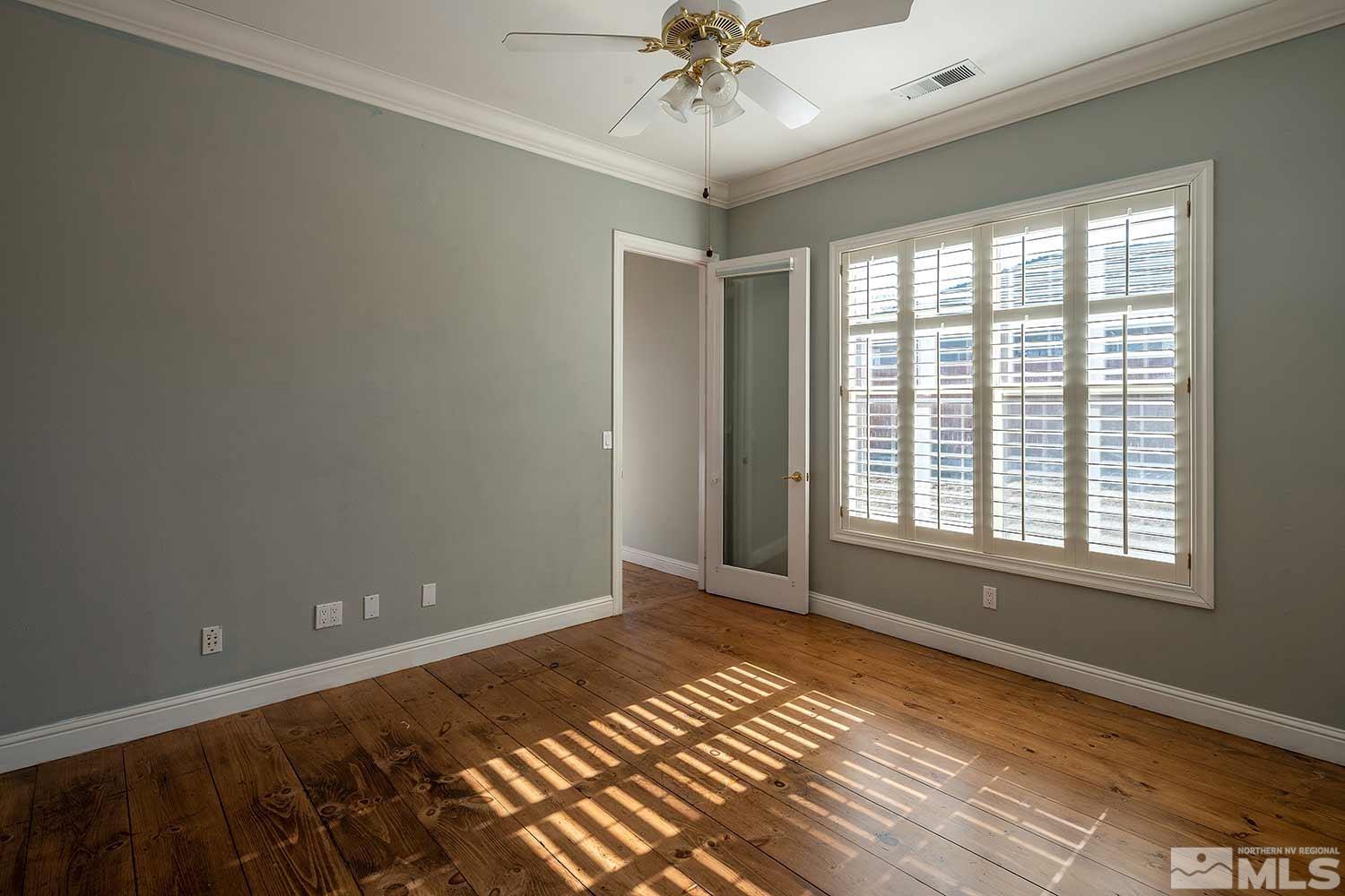 9785 Rolling Rock Court Reno, NV 89521 - Photo 20 of 35 a view of an empty room with a window