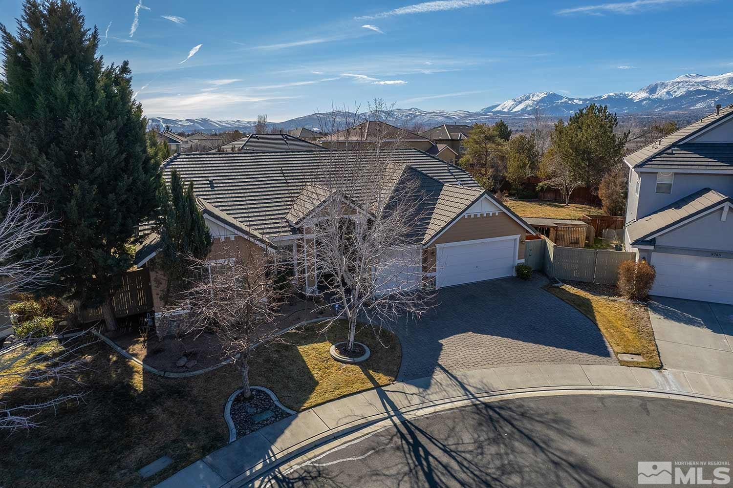 9785 Rolling Rock Court Reno, NV 89521 - Photo 2 of 35 an aerial view of a house with a yard and balcony