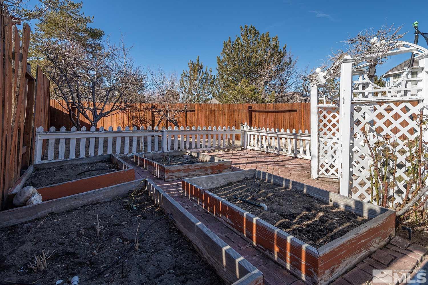 9785 Rolling Rock Court Reno, NV 89521 - Photo 34 of 35 a roof deck with wooden fence