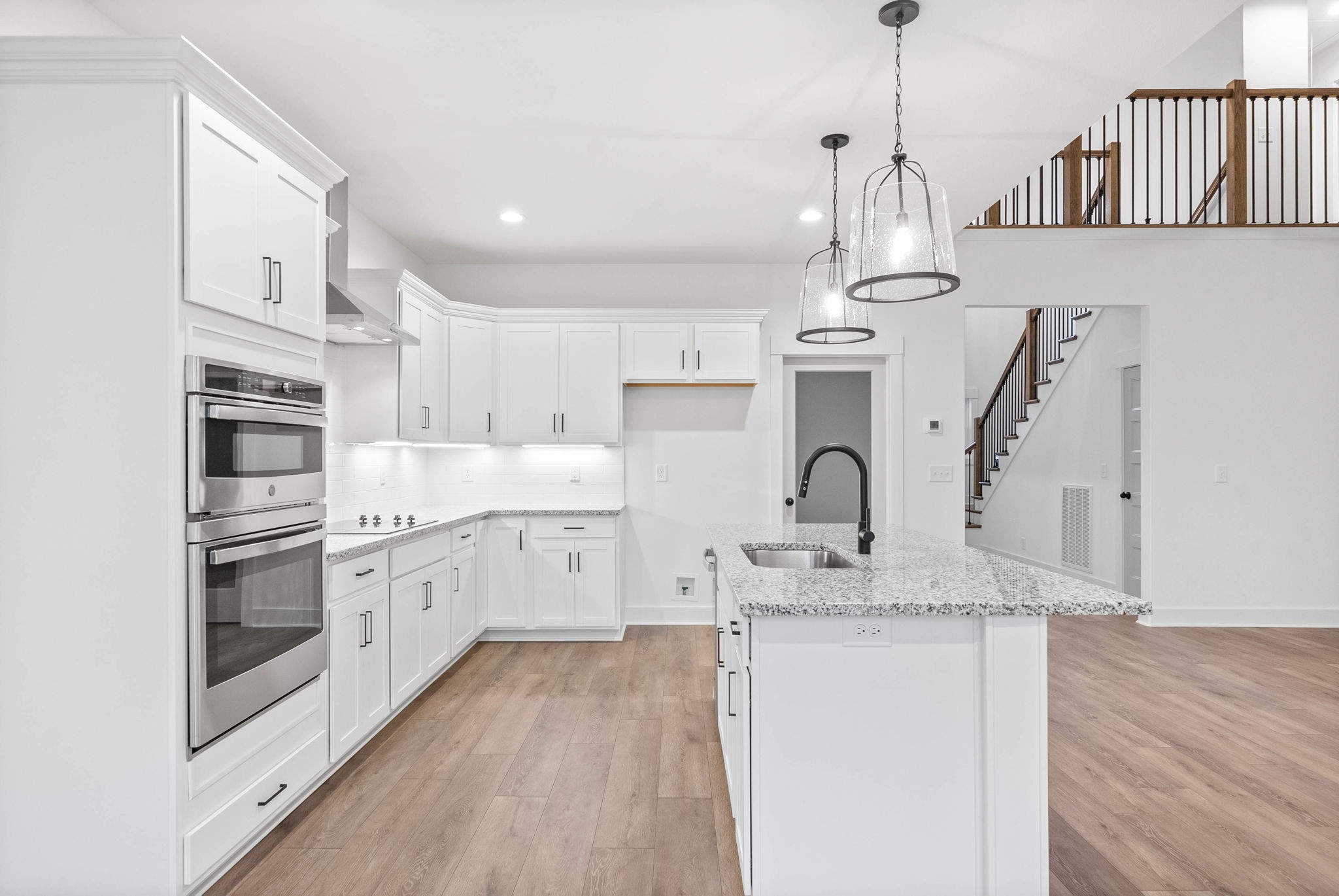 1360 Reda Drive Clarksville, TN 37042 - Photo 15 of 41 a kitchen with stainless steel appliances granite countertop a sink a stove and a refrigerator