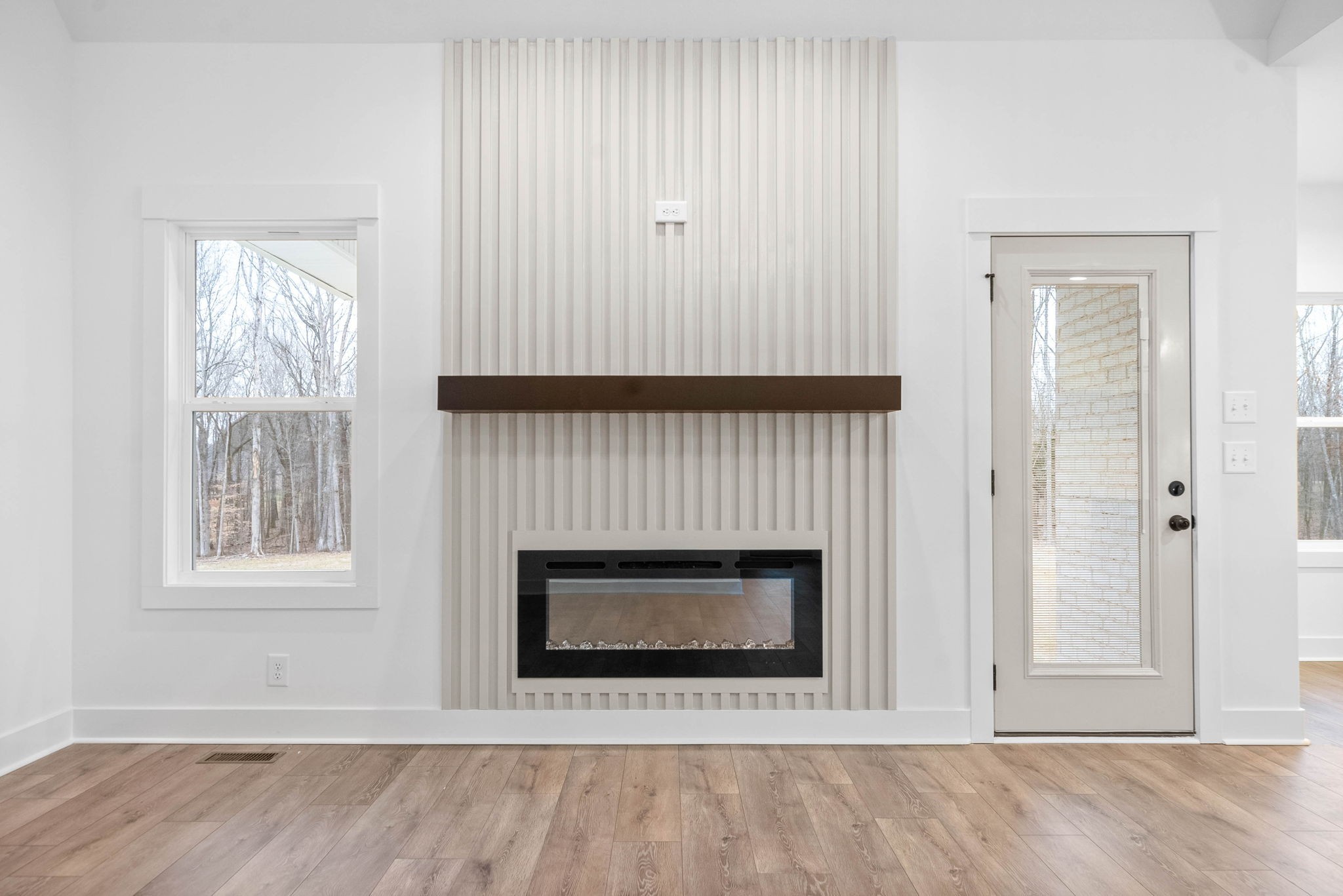 1360 Reda Drive Clarksville, TN 37042 - Photo 8 of 41 an empty room with windows and a fireplace