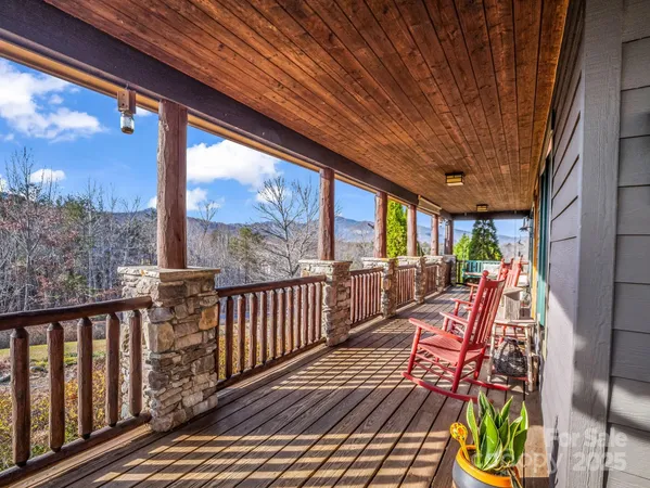 a view of balcony with furniture