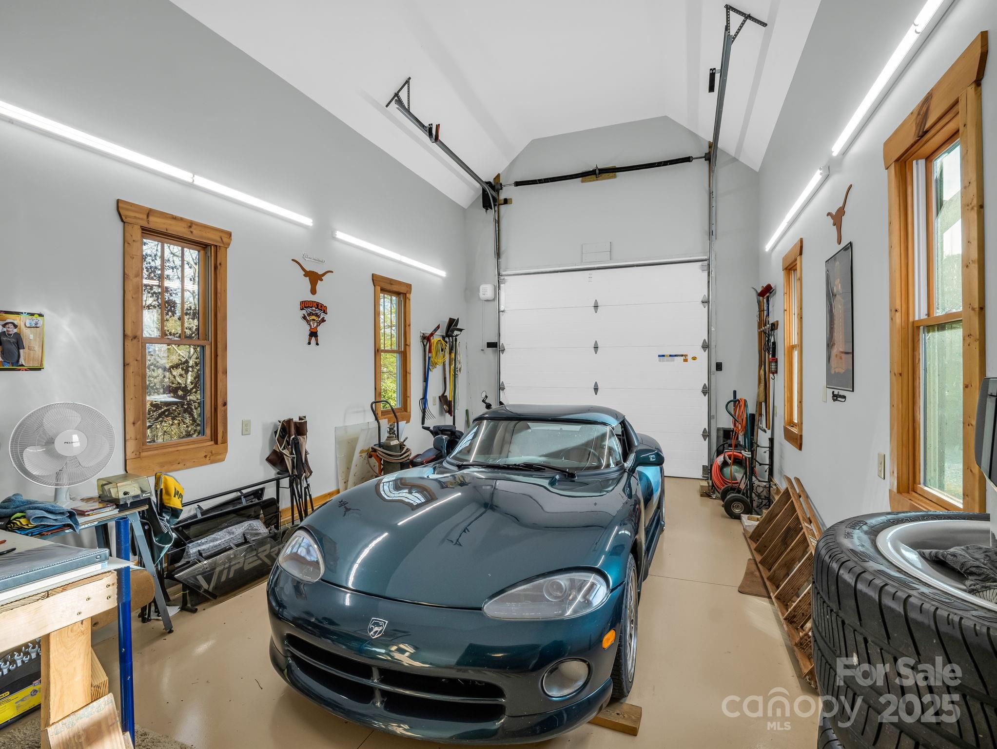 301 Peaks Drive Lake Lure, NC 28746 - Photo 32 of 48 a room with furniture and a window