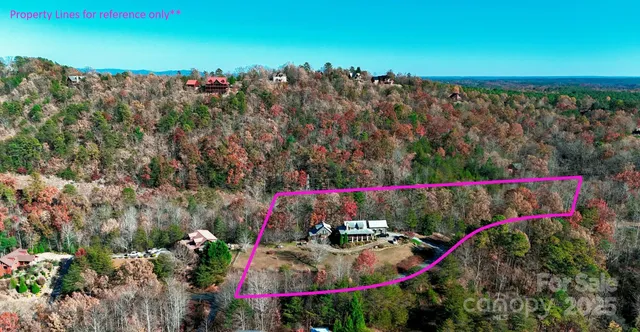 $834,000 | 301 Peaks Drive, Lake Lure, NC 28746