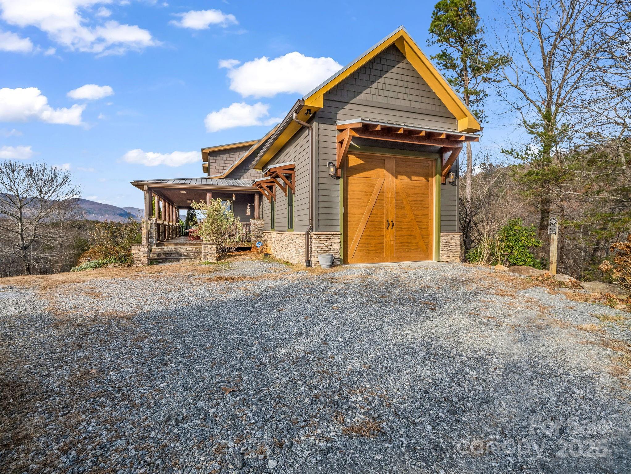 301 Peaks Drive Lake Lure, NC 28746 - Photo 7 of 48 a view of a house with a yard and large tree