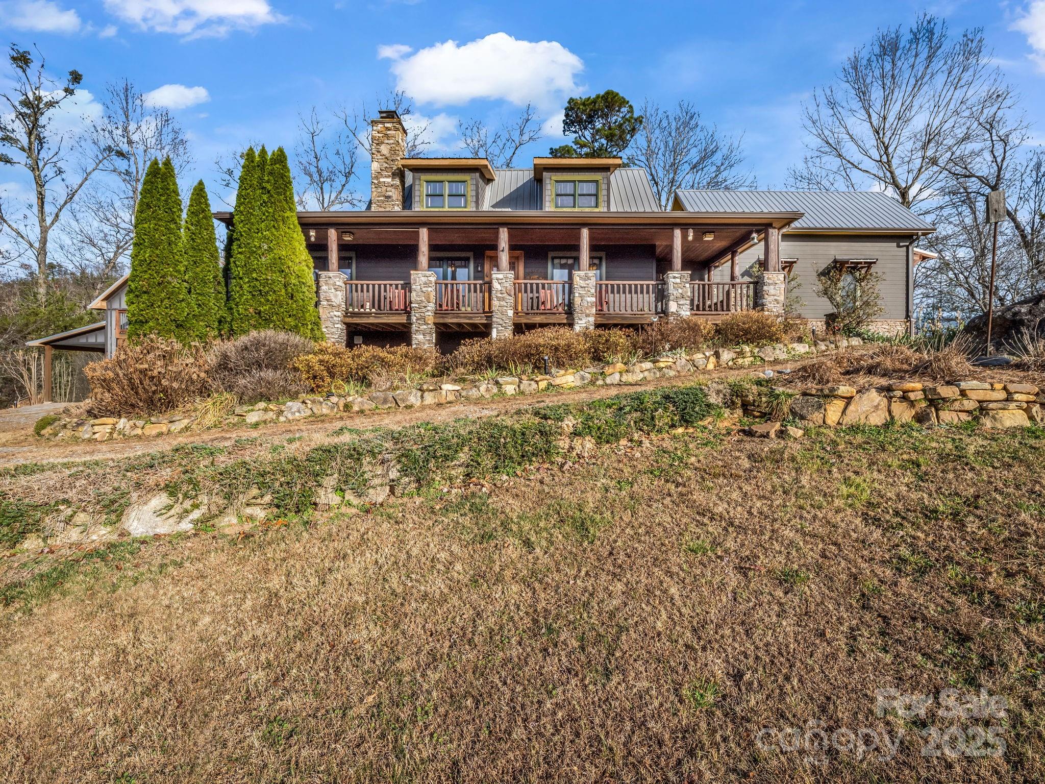 301 Peaks Drive Lake Lure, NC 28746 - Photo 10 of 48 a view of a house with a outdoor space