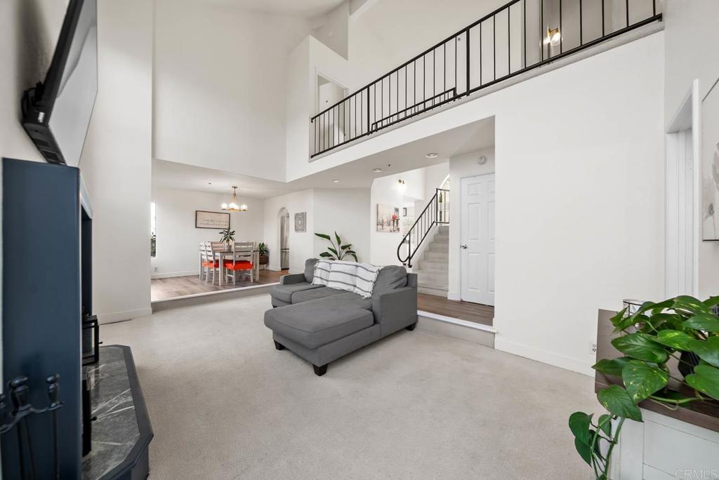 3863 Settineri Lane Spring Valley, CA 91977 - Photo 11 of 39 a living room with furniture and a potted plant