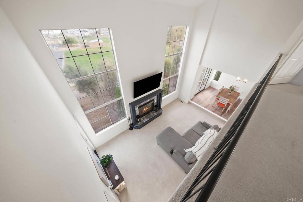 3863 Settineri Lane Spring Valley, CA 91977 - Photo 12 of 39 a living room with furniture and a flat screen tv