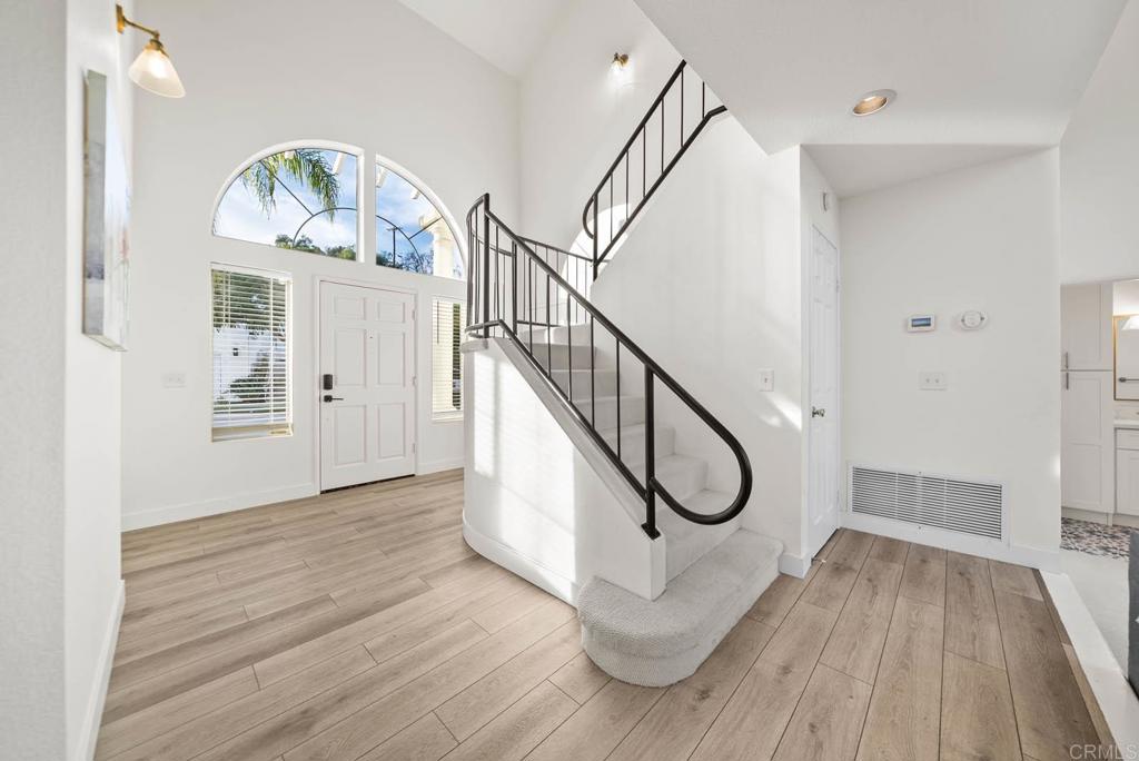 3863 Settineri Lane Spring Valley, CA 91977 - Photo 14 of 39 a view of an entryway with wooden floor