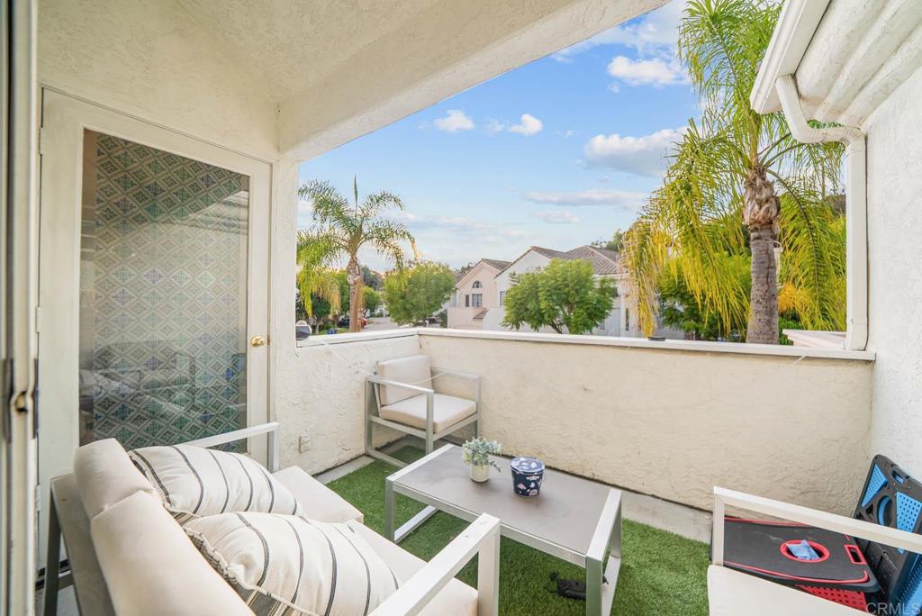3863 Settineri Lane Spring Valley, CA 91977 - Photo 26 of 39 a view of a dining room with furniture a potted plant and a large window