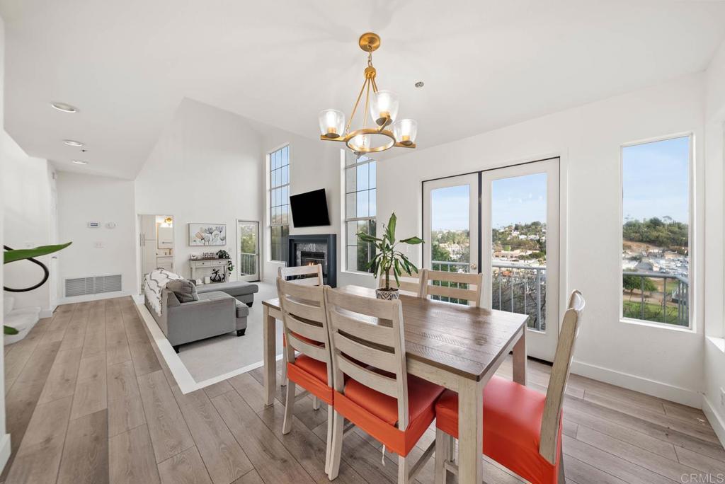 3863 Settineri Lane Spring Valley, CA 91977 - Photo 7 of 39 a view of a dining room with furniture window and wooden floor