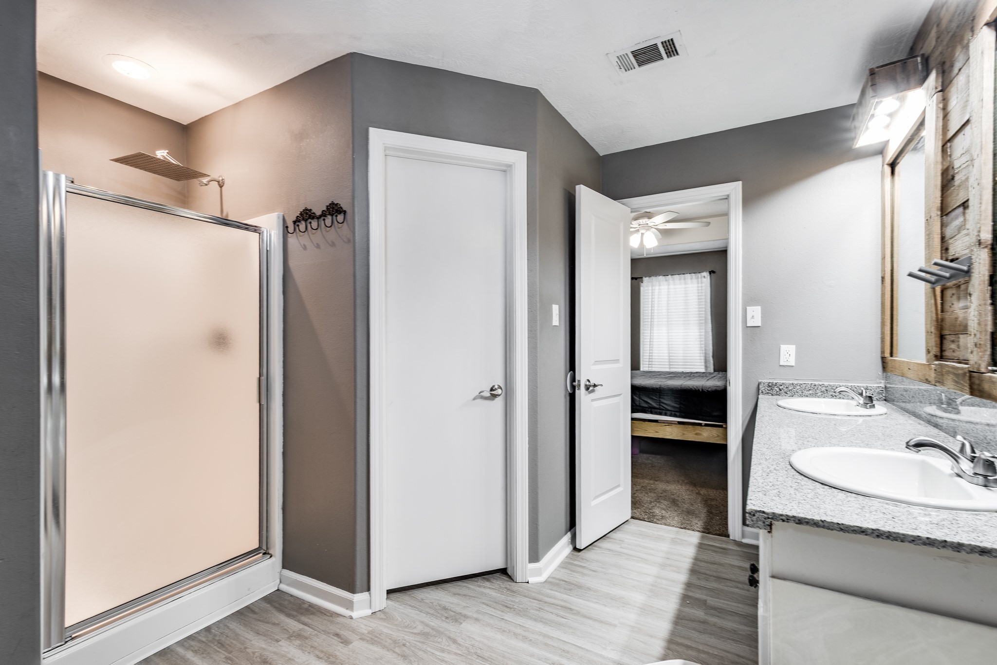 16392 Many Trees Lane Conroe, TX 77302 - Photo 20 of 33 The rain showerhead makes your oasis perfect