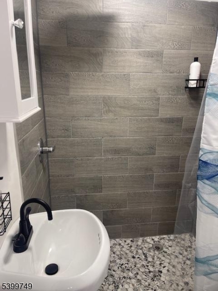 2420 East Edgar Road, Unit 2 Linden, NJ 07036 - Photo 6 of 8 a bathroom with a sink