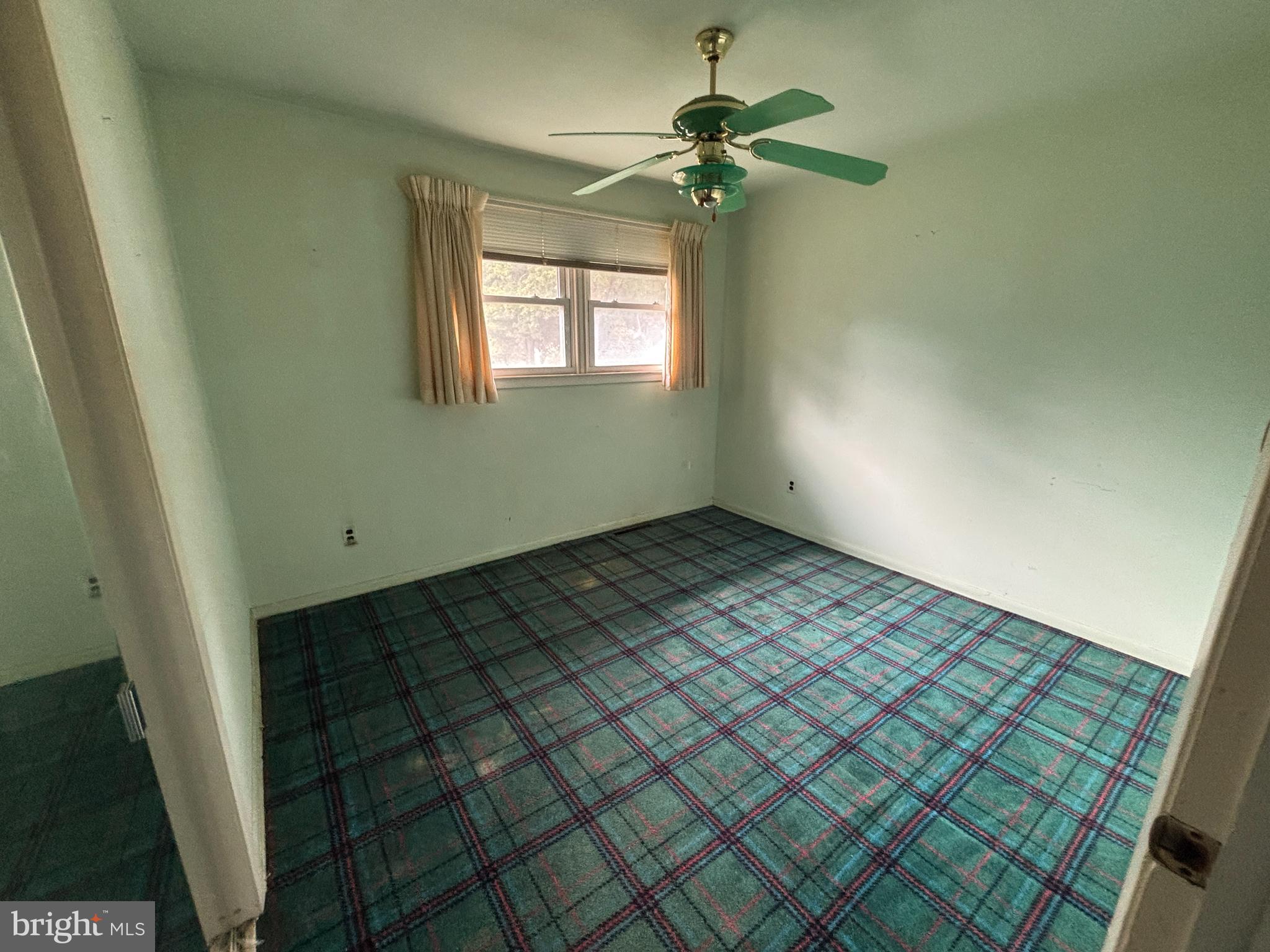 423 Park Boulevard Moorestown, NJ 08057 - Photo 14 of 24 a view of an empty room and a window