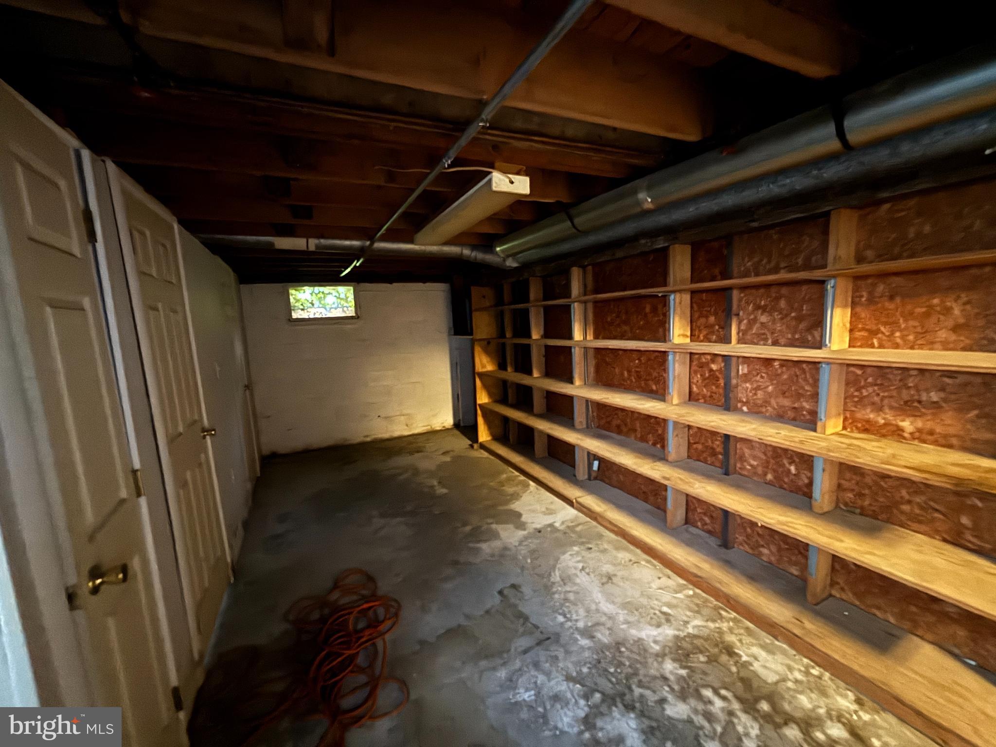 423 Park Boulevard Moorestown, NJ 08057 - Photo 20 of 24 a view of an empty room with wooden floor and a window