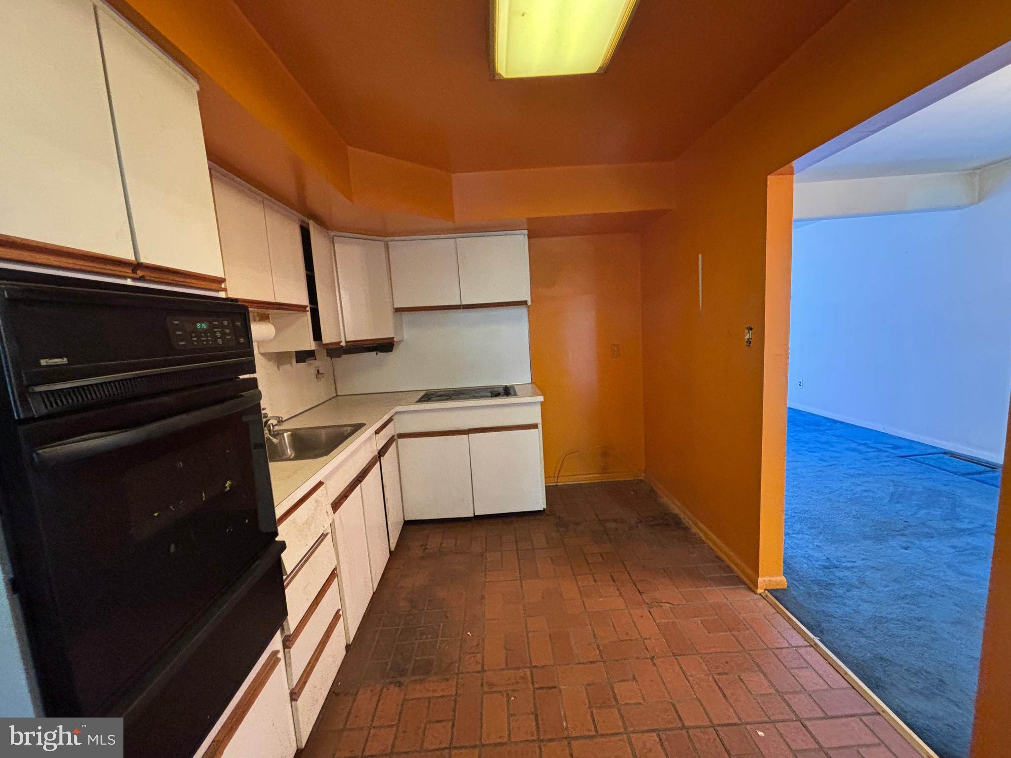 423 Park Boulevard Moorestown, NJ 08057 - Photo 6 of 24 a kitchen with a stove a sink and a refrigerator