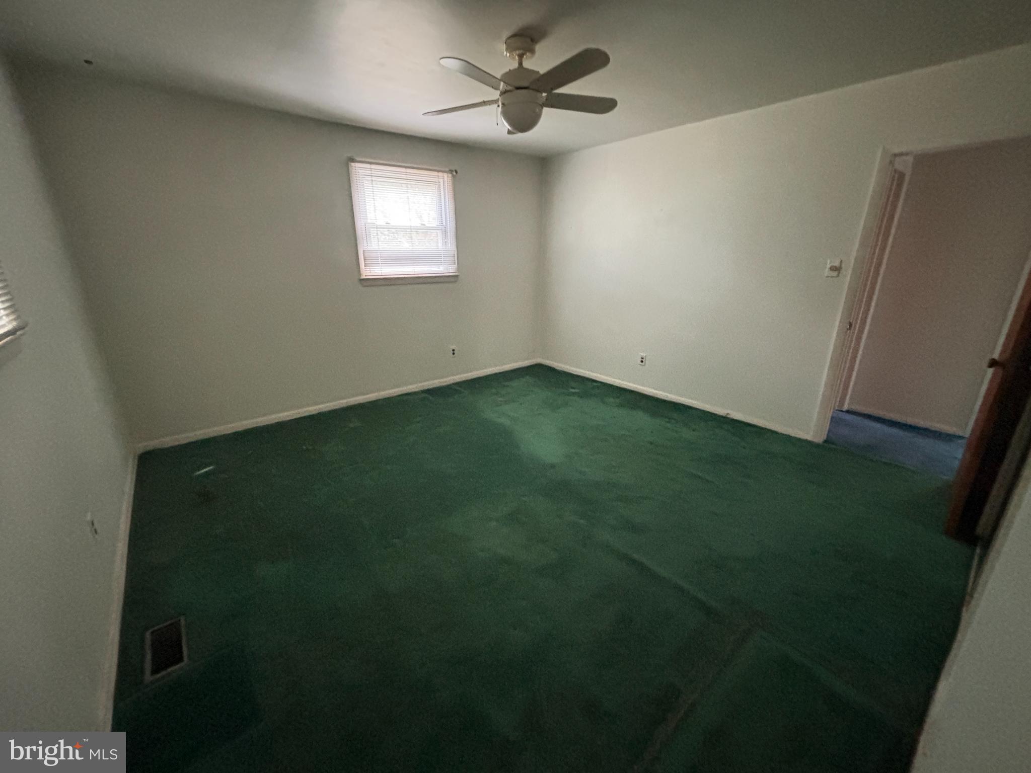 423 Park Boulevard Moorestown, NJ 08057 - Photo 10 of 24 a view of an empty room with a window