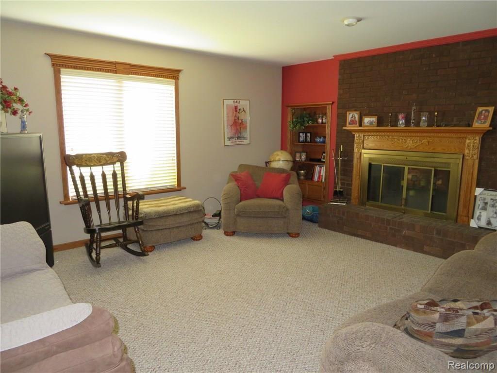 8705 Tindall Road Davisburg, MI 48350 - Photo 13 of 68 living room w/fireplace
