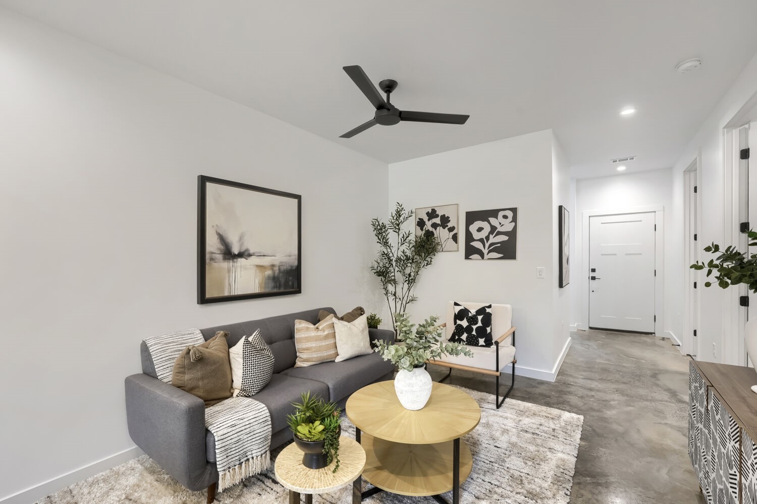 4805 Sara Drive Austin, TX 78721 - Photo 5 of 28 a living room with furniture and a dining table