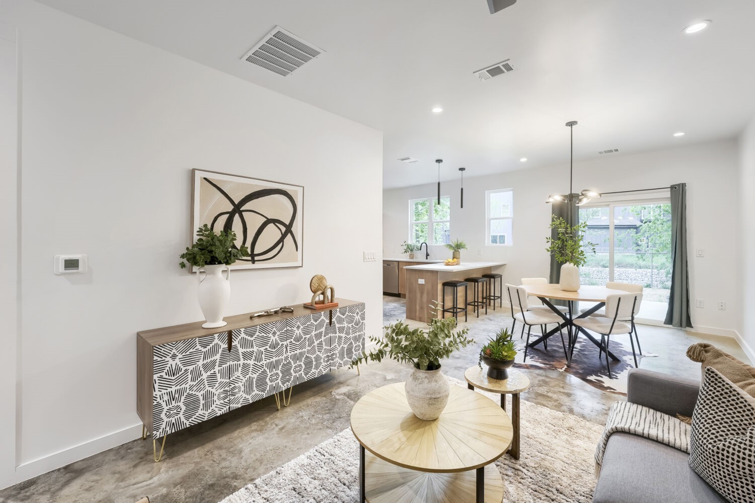 4805 Sara Drive Austin, TX 78721 - Photo 6 of 28 a living room with furniture and a chandelier