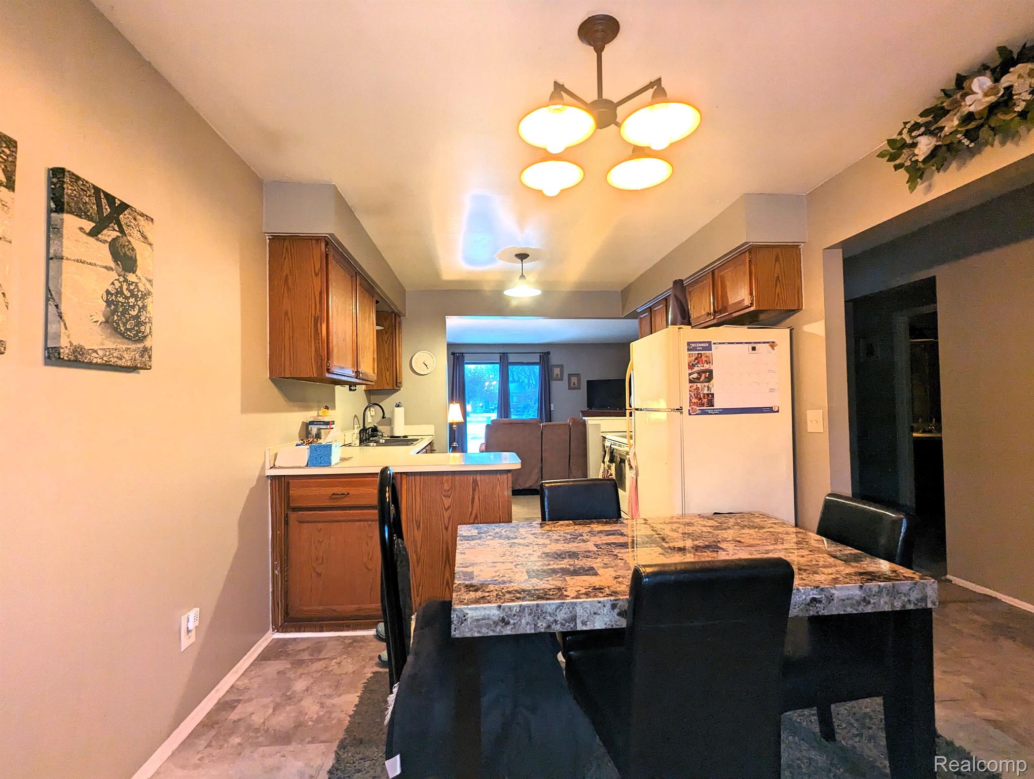 57287 Beaconsfield Road, Unit 36 Washington, MI 48094 - Photo 2 of 15 Dedicated dining space off kitchen