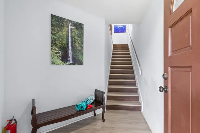 a view of entryway with stairs