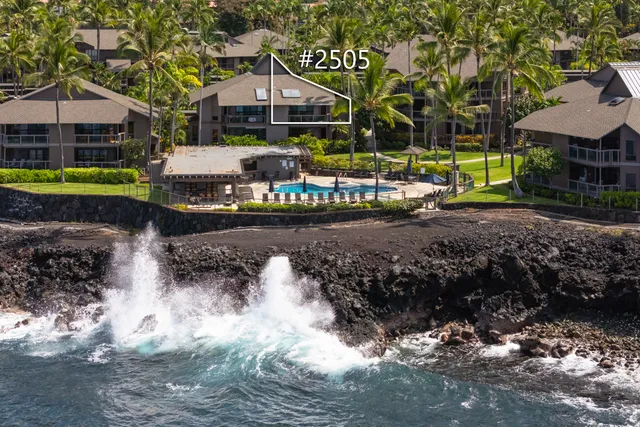 a view of a living room and a floor to ceiling window