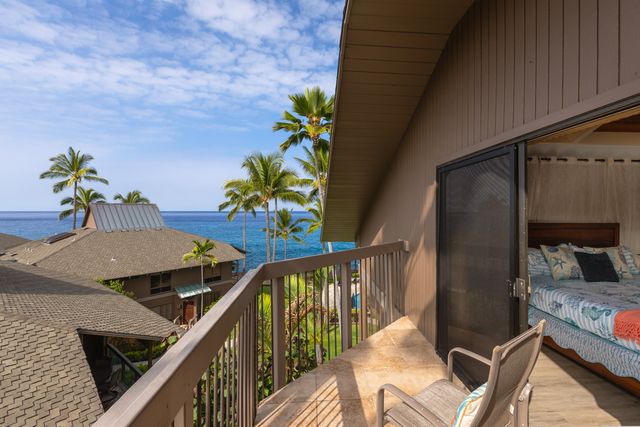 a view of a balcony dining area