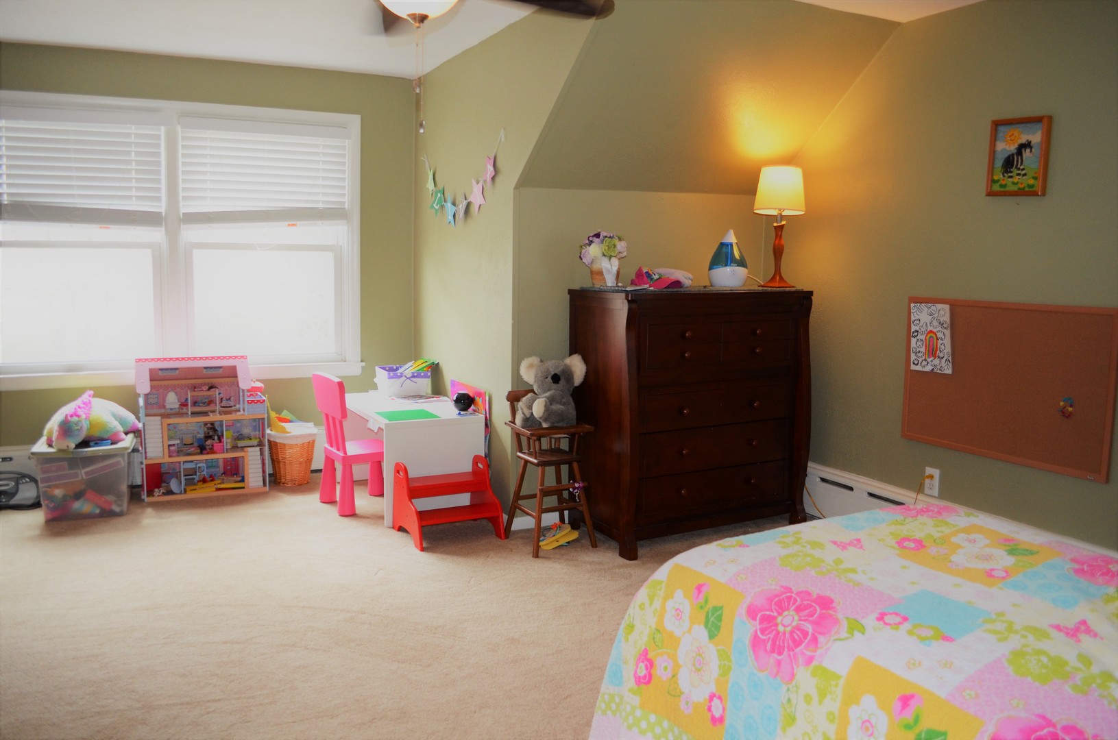 825 Oak Street Elgin, IL 60123 - Photo 9 of 17 a bedroom with a bed and a window