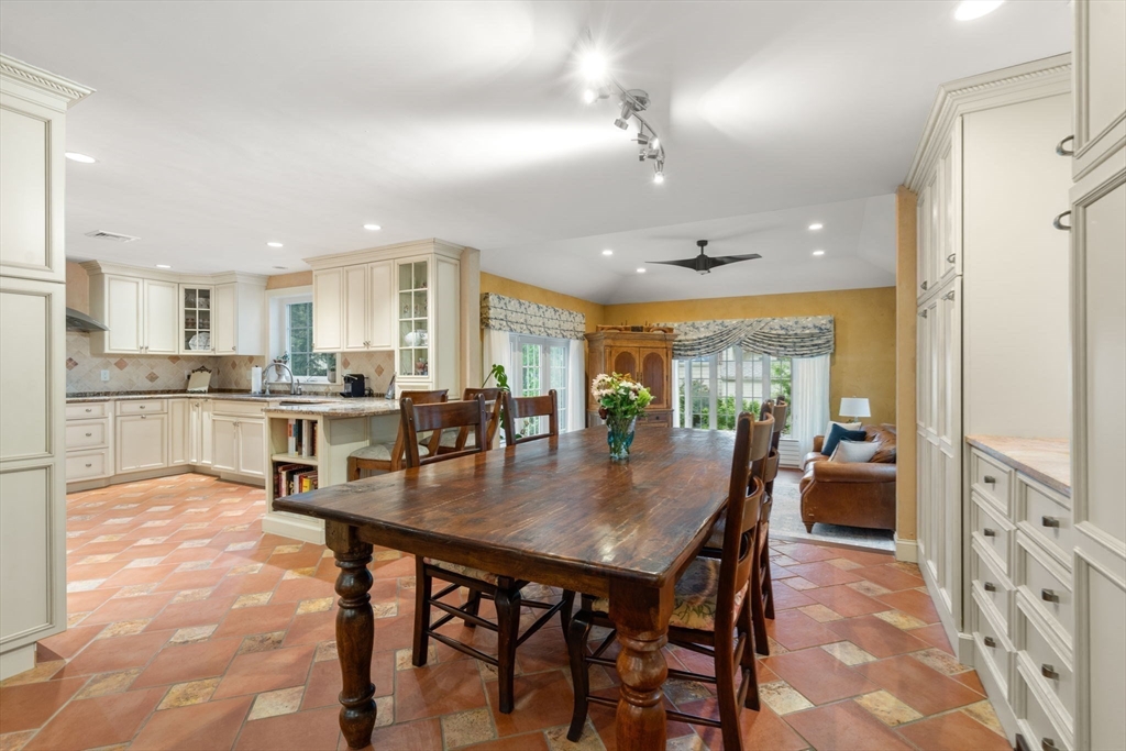24 Mohawk Road Arlington, MA 02474 - Photo 6 of 42 a dining room with furniture and a floor to ceiling window