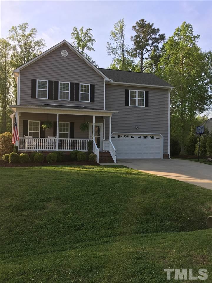 1412 Shady Rise Glen Raleigh, NC 27603 - Photo 1 of 25 Beautiful home with fresh landscaping, rocking chair front porch, and 2-car garage.