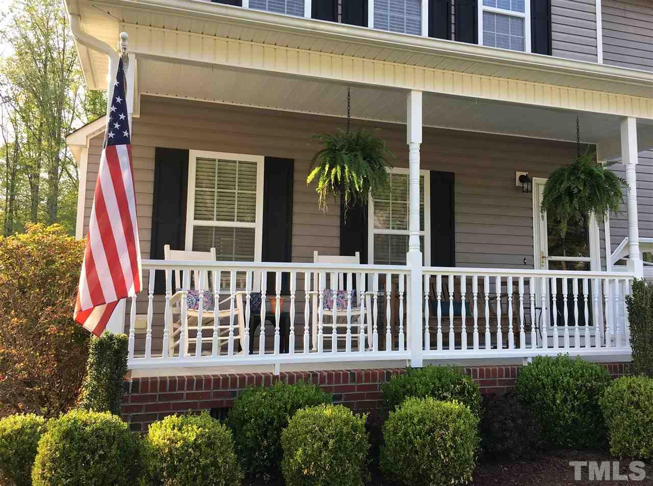 1412 Shady Rise Glen Raleigh, NC 27603 - Photo 2 of 25 Enjoy the great weather on this peaceful rocking chair front porch!