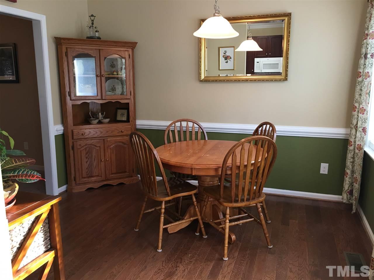 1412 Shady Rise Glen Raleigh, NC 27603 - Photo 11 of 25 Dining room with access to deck and large back yard.