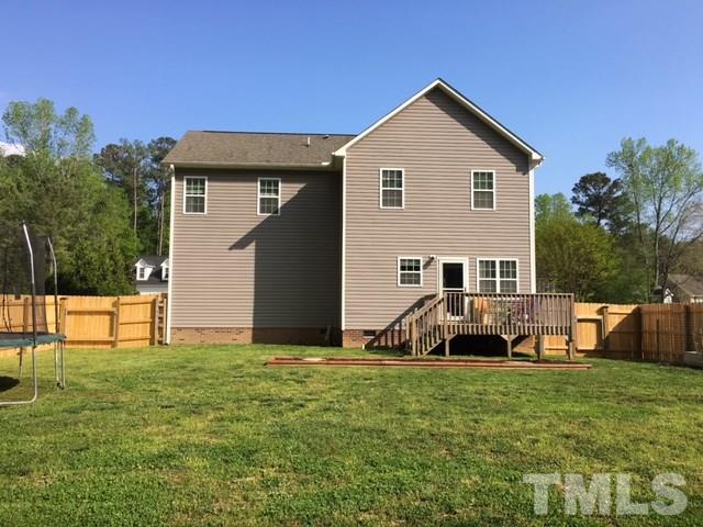 1412 Shady Rise Glen Raleigh, NC 27603 - Photo 22 of 25 Tons of room in this back yard! Raised garden, fire pit, and room for outdoor activities. New fence recently installed.