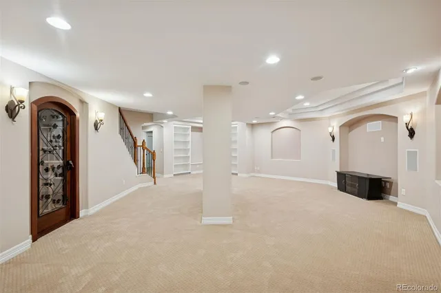 a view of a balcony with wooden floor