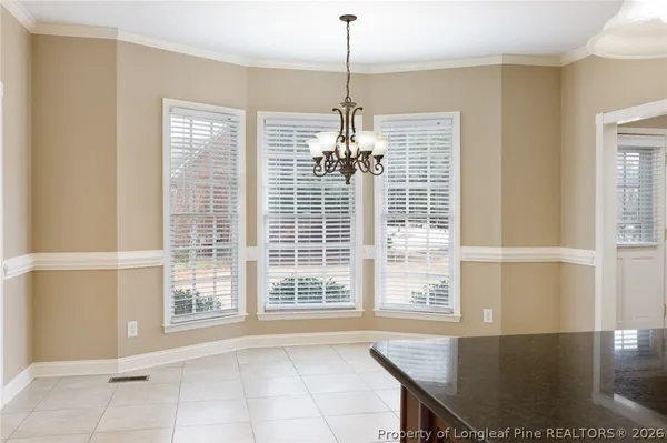 a view of a bathroom from a hallway