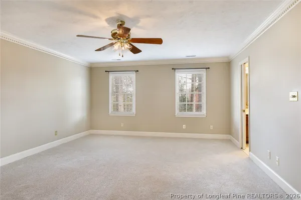 an empty room that has a bathroom