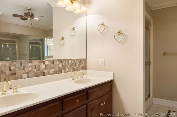 a bathroom with a bathtub and a sink