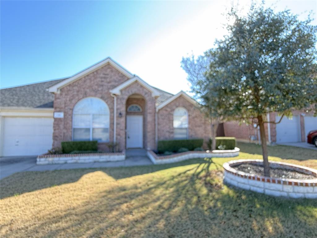 131 Fallkirk Drive Coppell, TX 75019 - Photo 2 of 20 a view of a house with backyard and trees