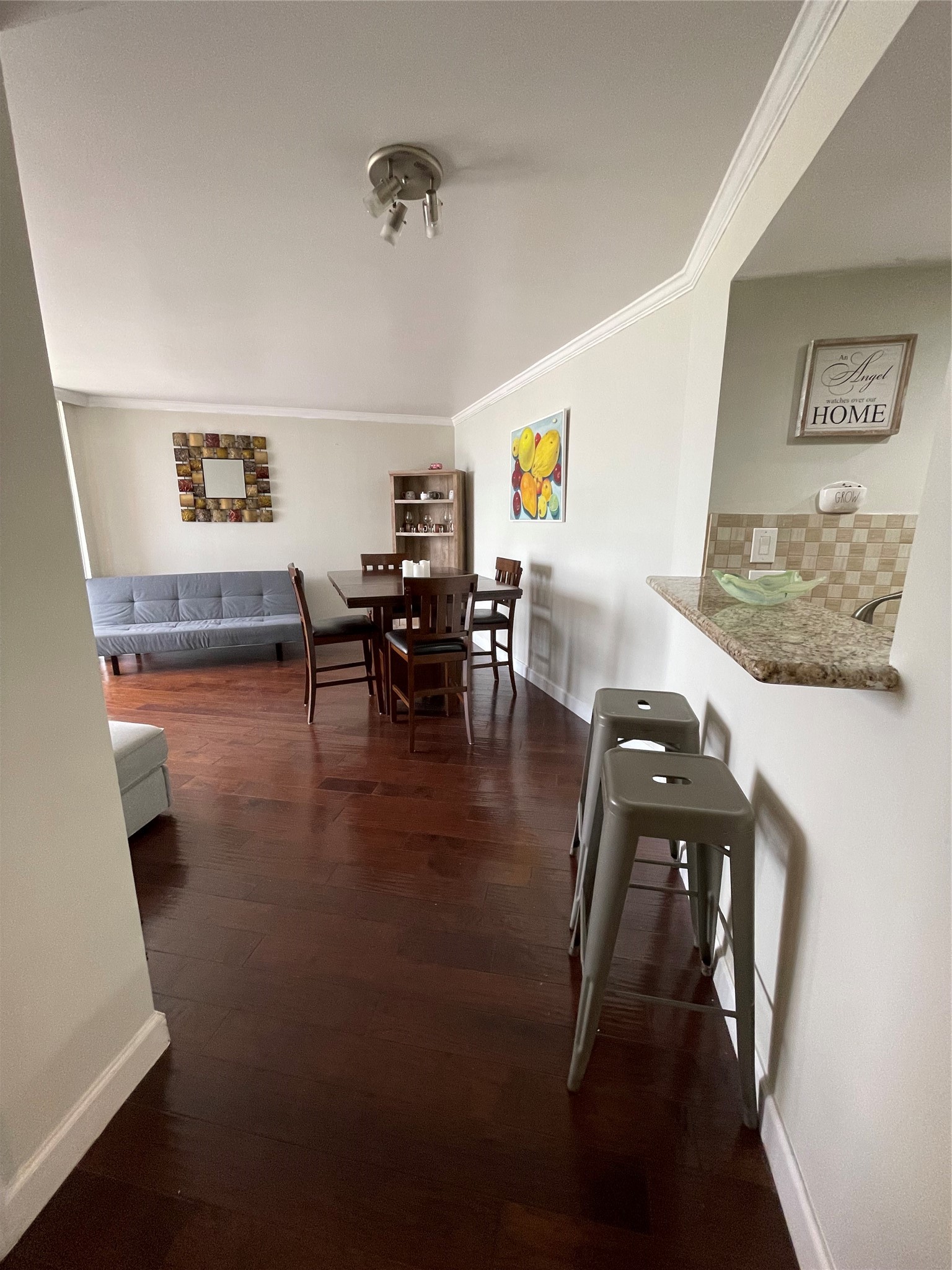 3525 Sage Road, Unit 1401 Houston, TX 77056 - Photo 16 of 22 a living room with furniture and a wooden floor