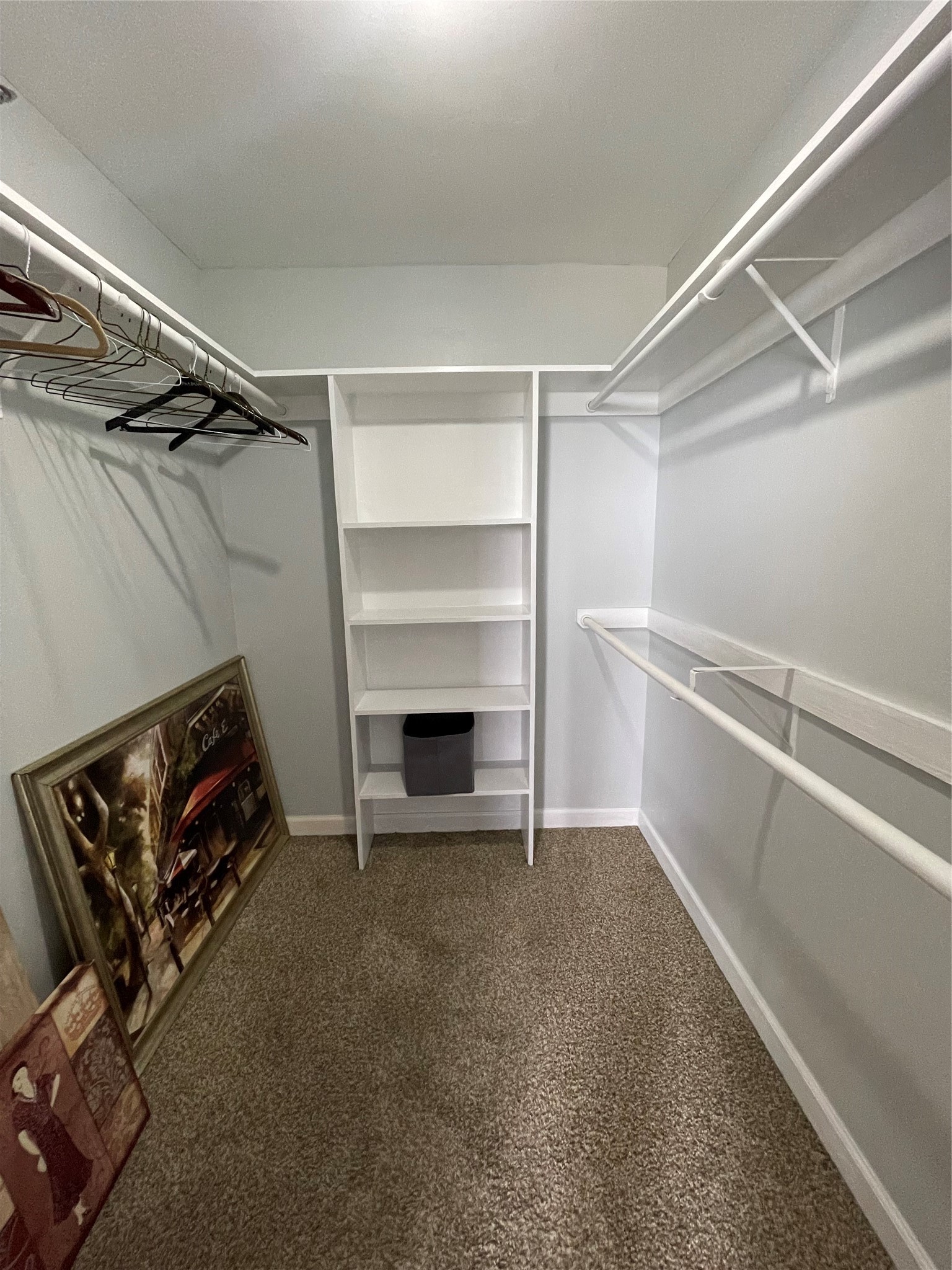 3525 Sage Road, Unit 1401 Houston, TX 77056 - Photo 21 of 22 a view of a room with rack on the wall