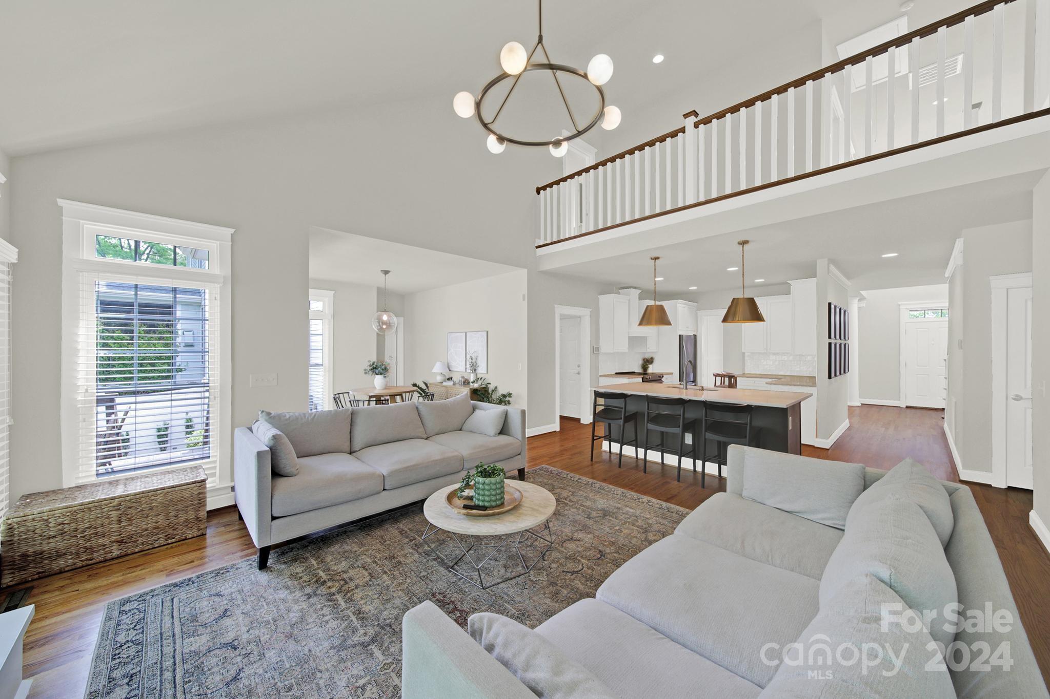 130 Mills Lane Fort Mill, SC 29708 - Photo 17 of 48 a living room with furniture and a large window