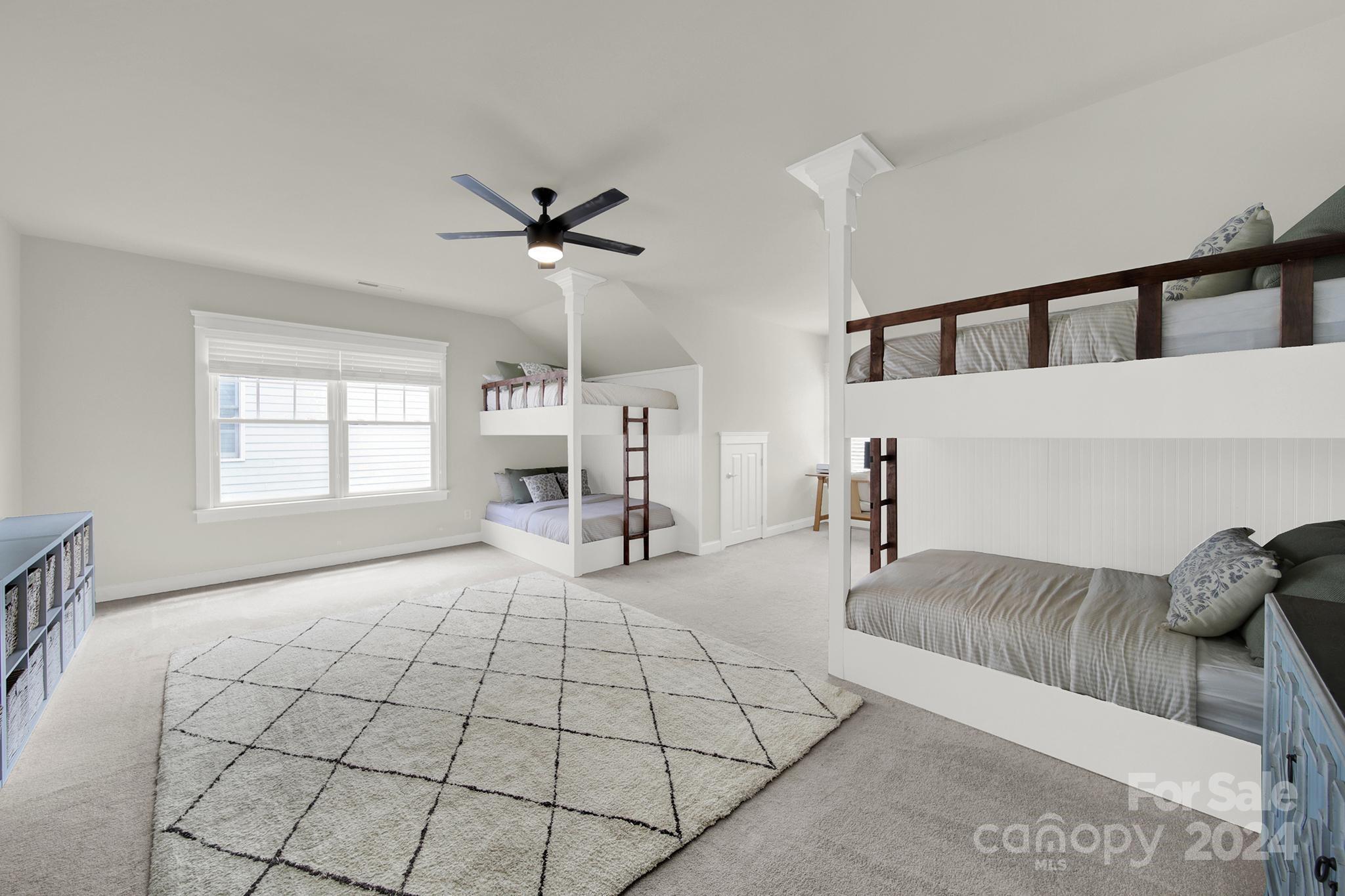 130 Mills Lane Fort Mill, SC 29708 - Photo 37 of 48 a living room with furniture and a chandelier