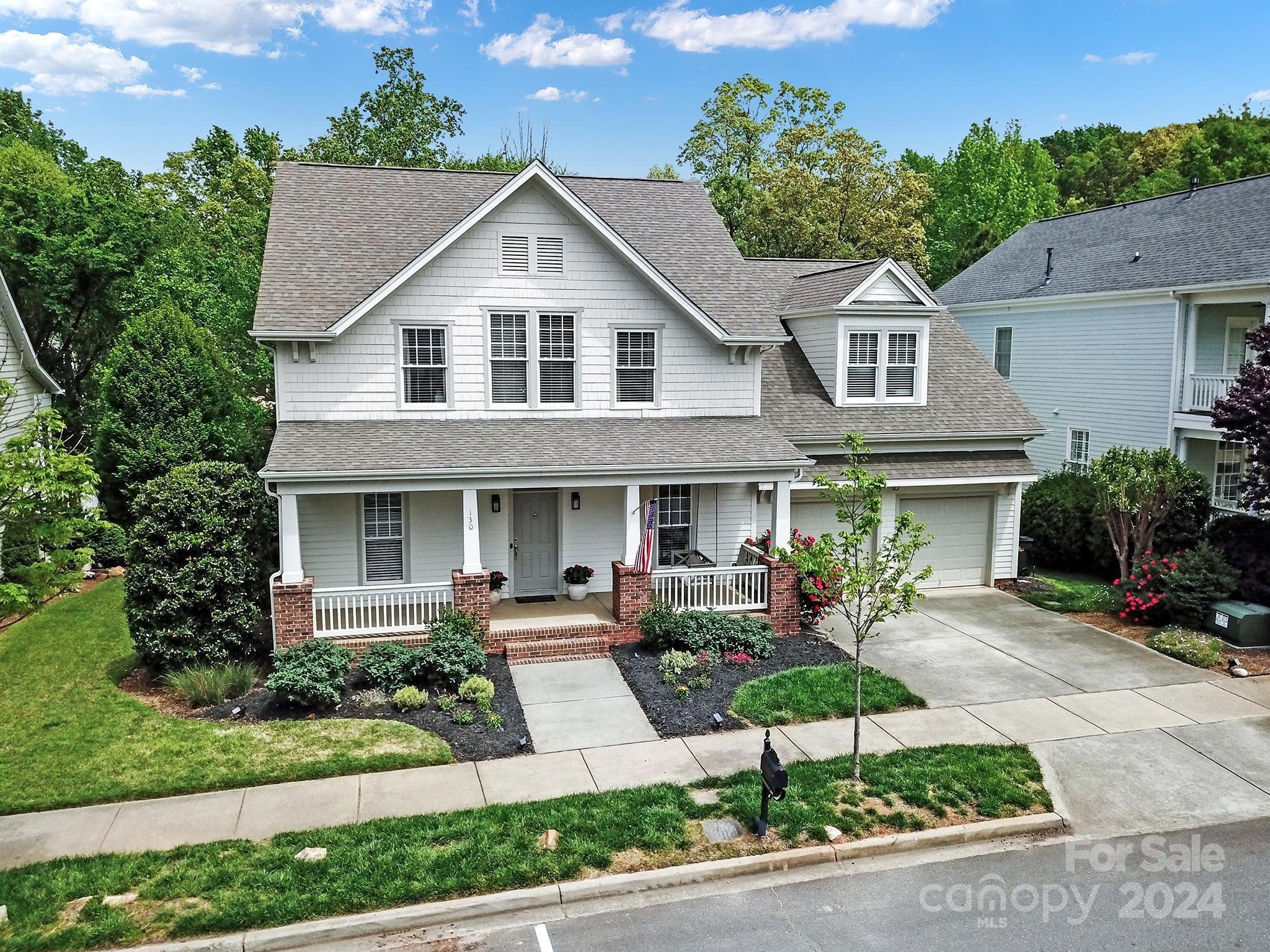 130 Mills Lane Fort Mill, SC 29708 - Photo 44 of 48 a front view of a house with a yard