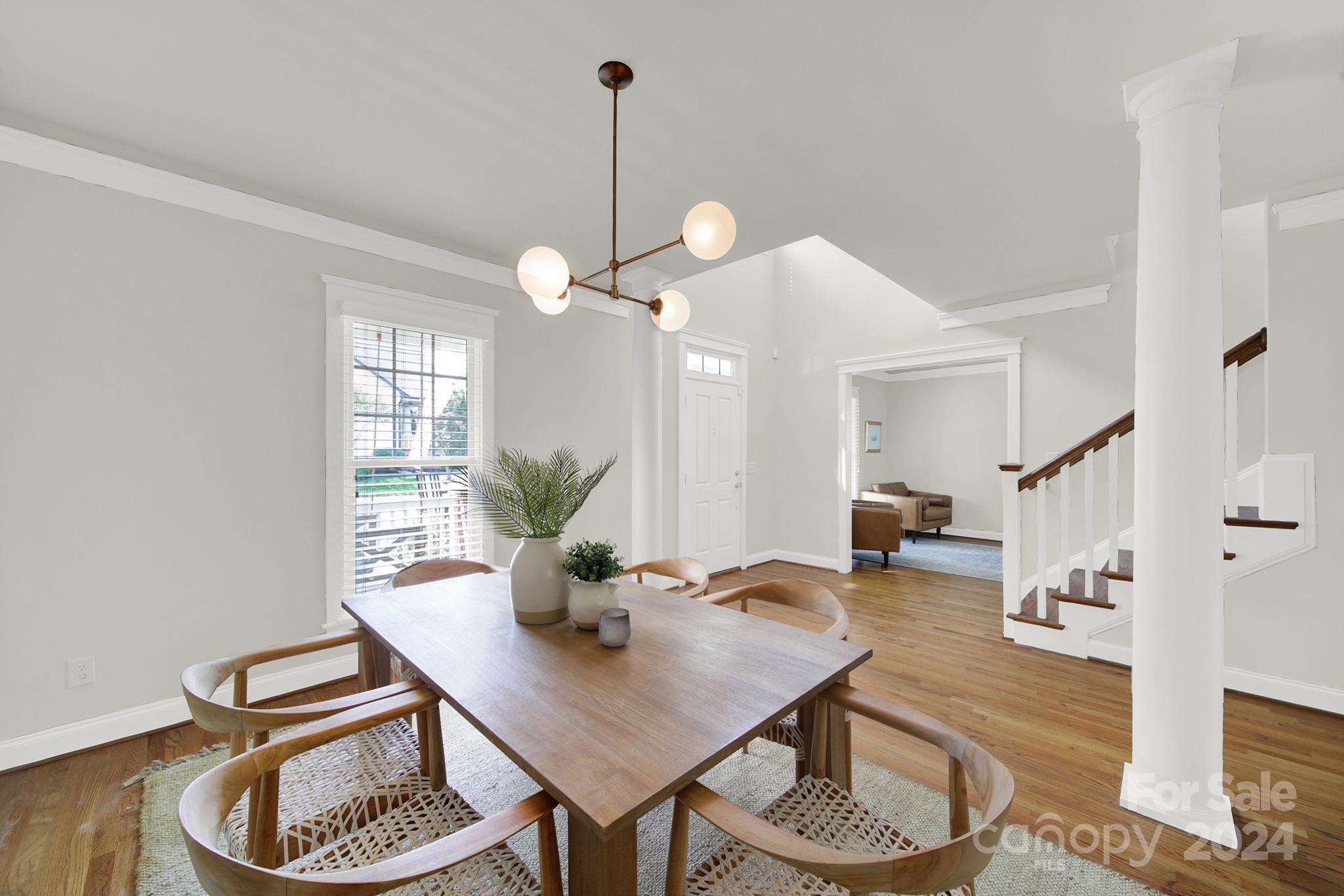 130 Mills Lane Fort Mill, SC 29708 - Photo 5 of 48 a view of a dining room with furniture window and wooden floor